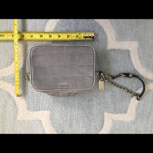Coach wristlet purse. Grey with silver hand chain.